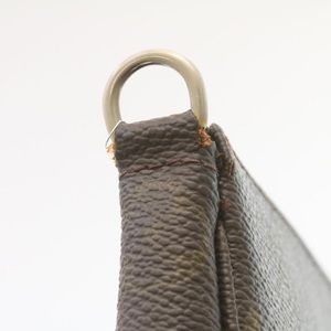 Pochette Accessoires Monogram Canvas